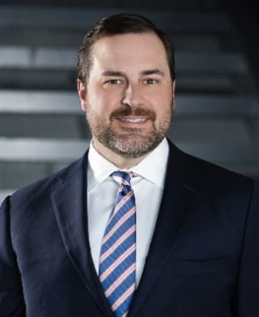 Russell Lewis, Senior Counsel